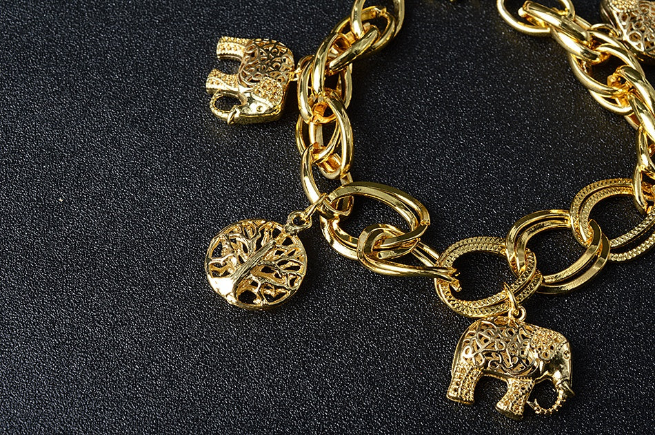 spirit of nature – goldfarbenes charm-armband mit elefanten & lebensbaum - lunastein