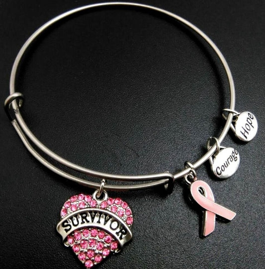 Herzensmut – Charm-Armband mit pinker Schleife & Survivor-Herz - Lunastein