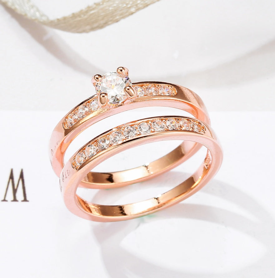 promise glow – roségold-ring-set mit funkelnden zirkonia - lunastein