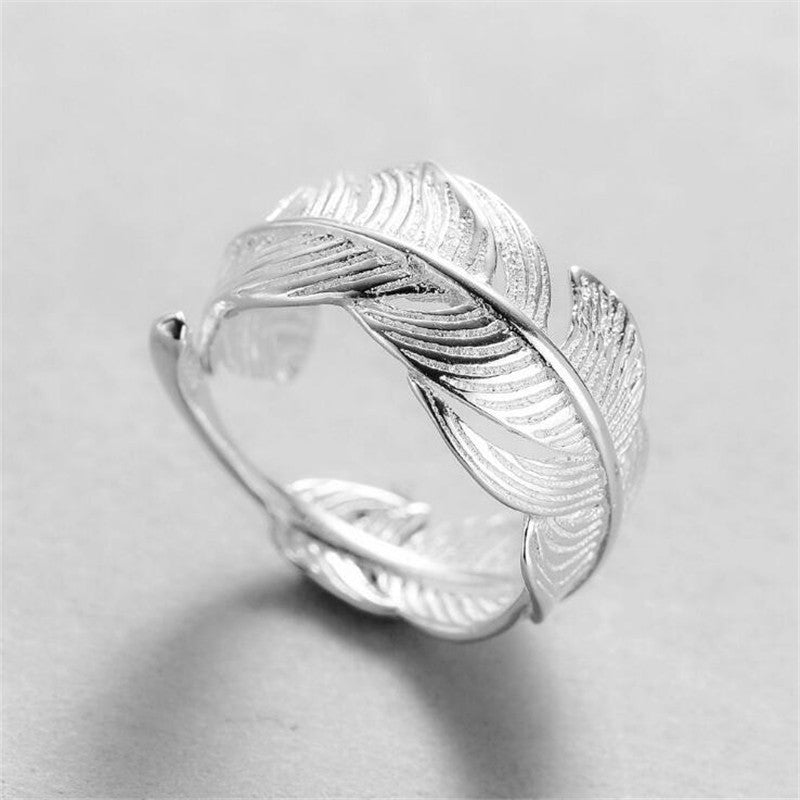 forest whisper – verstellbarer blätter-ring mit zirkonia aus 925er silber - lunastein