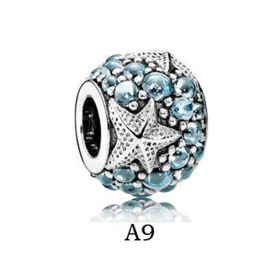 ocean star charm – meeresperle mit seestern & blauen kristallen - lunastein