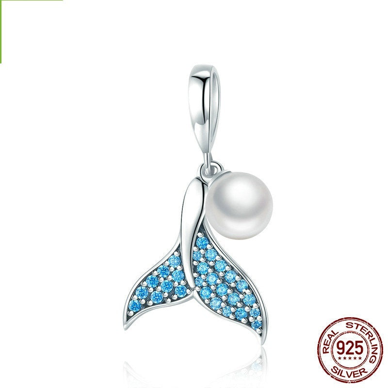 ocean spirit charm – anhänger mit delphinflosse & stern in 925 silber - lunastein