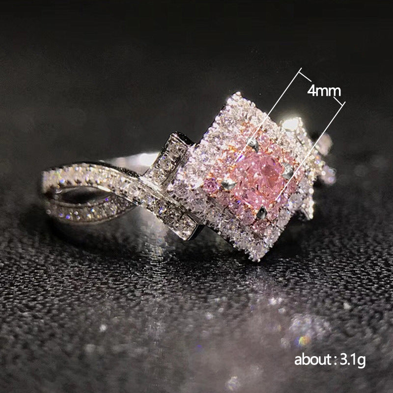 pink aurora – zirkonia-ring mit funkelndem zentrum - lunastein