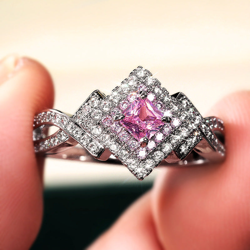 pink aurora – zirkonia-ring mit funkelndem zentrum - lunastein