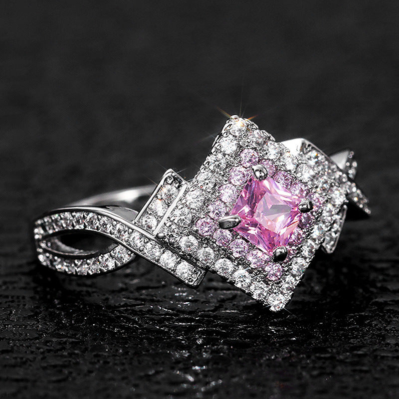 pink aurora – zirkonia-ring mit funkelndem zentrum - lunastein