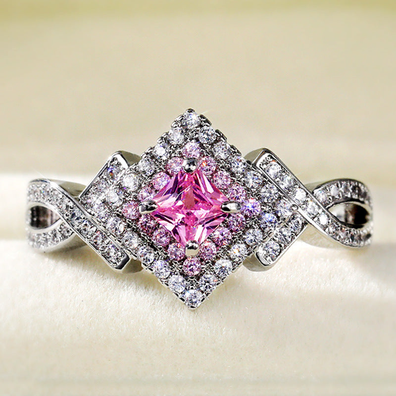 pink aurora – zirkonia-ring mit funkelndem zentrum - lunastein
