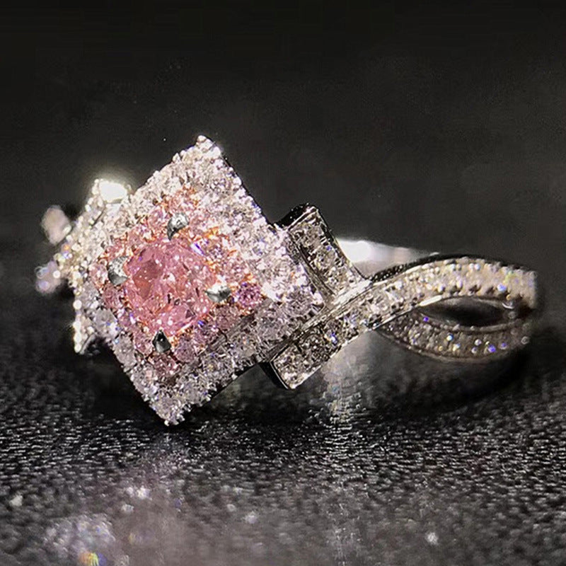 pink aurora – zirkonia-ring mit funkelndem zentrum - lunastein