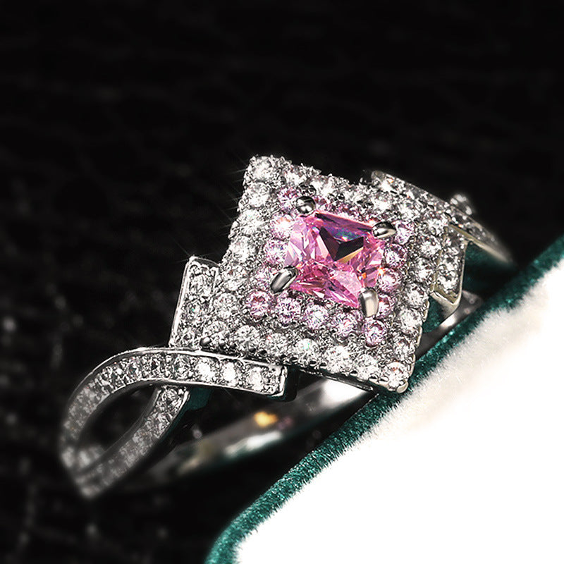 pink aurora – zirkonia-ring mit funkelndem zentrum - lunastein