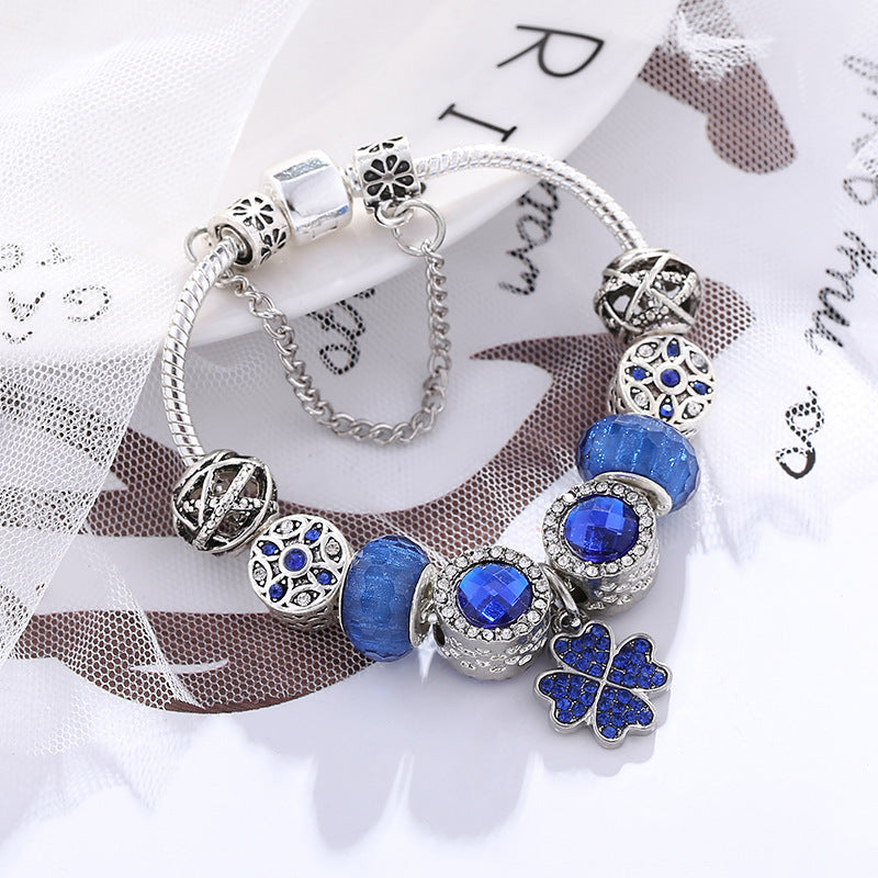 Ocean Luck - Elegantes Charm-Armband mit blauen Kristallen & Kleeblatt – Silberfarben - Lunastein