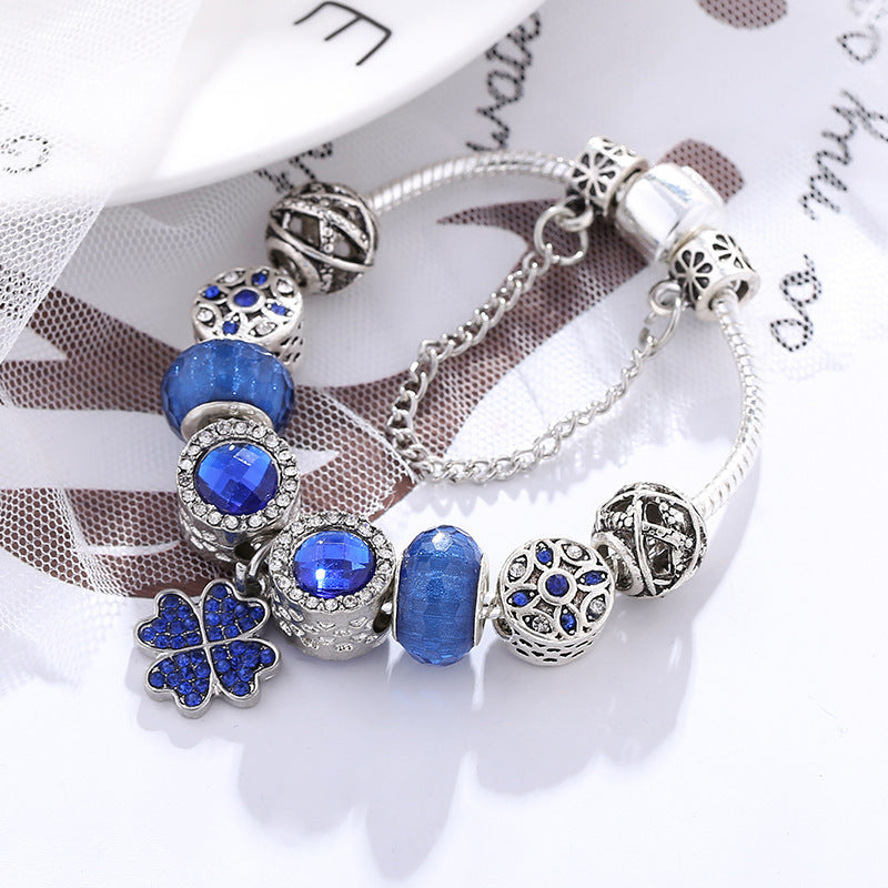 Ocean Luck - Elegantes Charm-Armband mit blauen Kristallen & Kleeblatt – Silberfarben - Lunastein