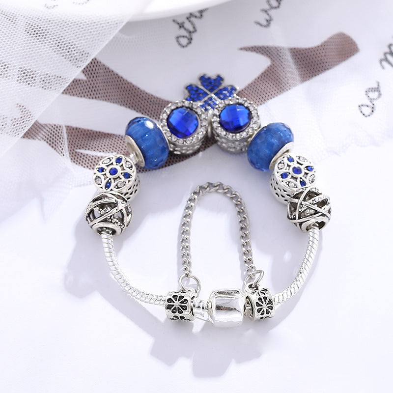 ocean luck - elegantes charm-armband mit blauen kristallen & kleeblatt – silberfarben - lunastein