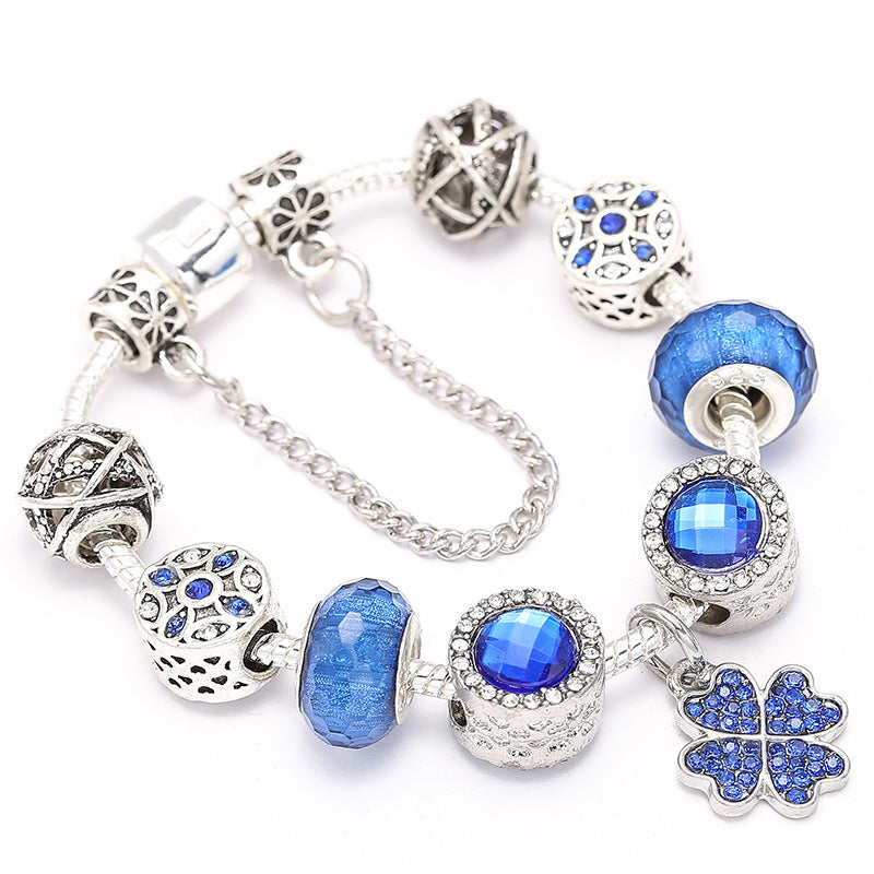 Ocean Luck - Elegantes Charm-Armband mit blauen Kristallen & Kleeblatt – Silberfarben - Lunastein