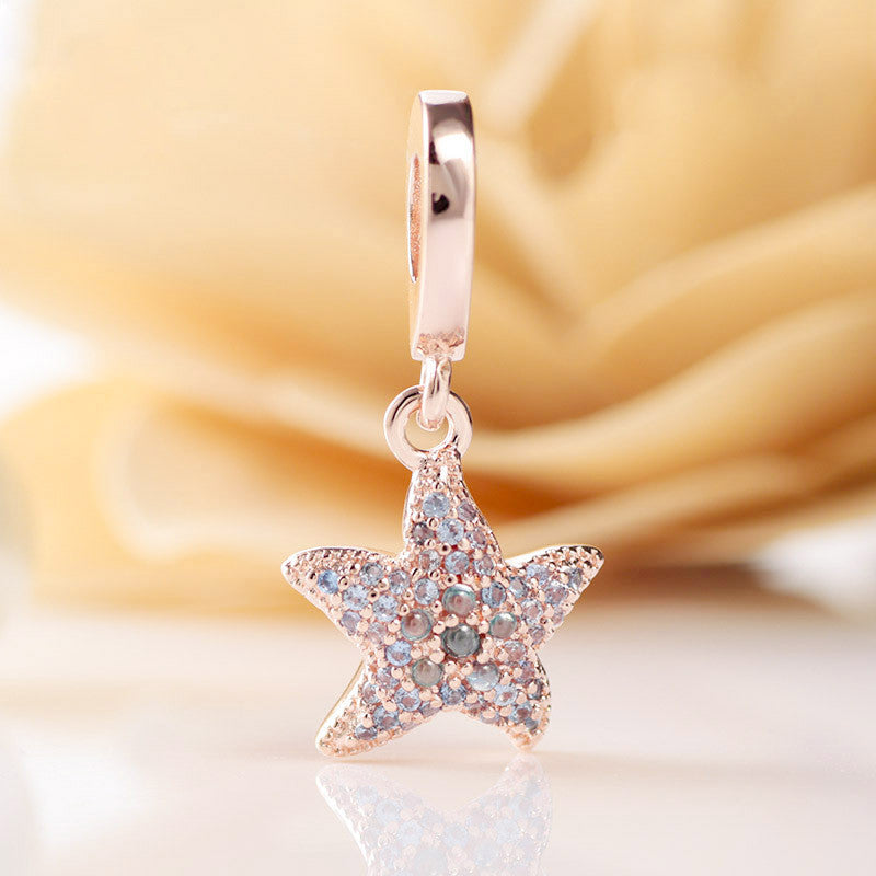 Shiny Ocean Charm – Roségoldener Seestern-Anhänger mit Zirkonia aus 925 Silber - Lunastein