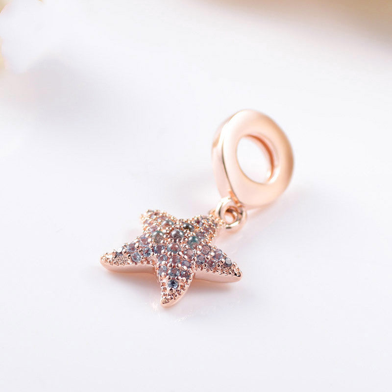Shiny Ocean Charm – Roségoldener Seestern-Anhänger mit Zirkonia aus 925 Silber - Lunastein