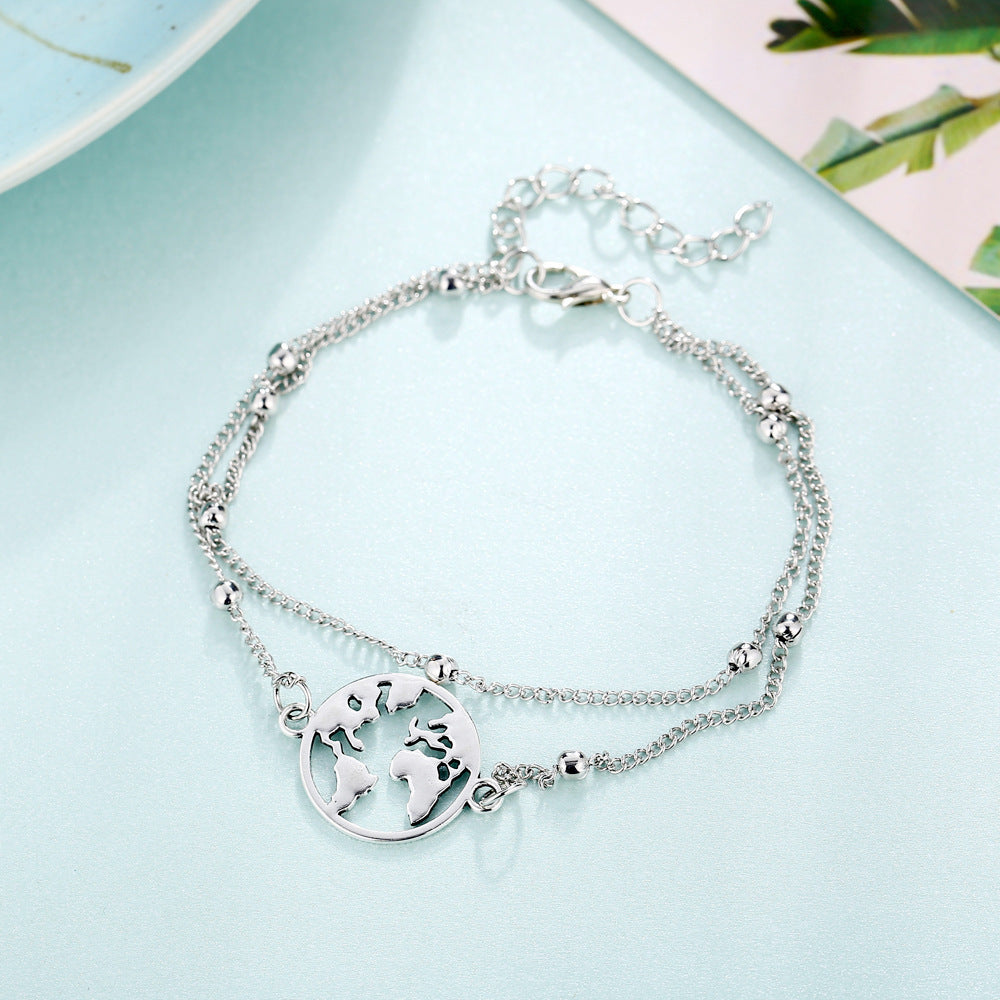 wanderlove – 3-teiliges fußkettchen-set in silber mit symbolen - lunastein - schmuck