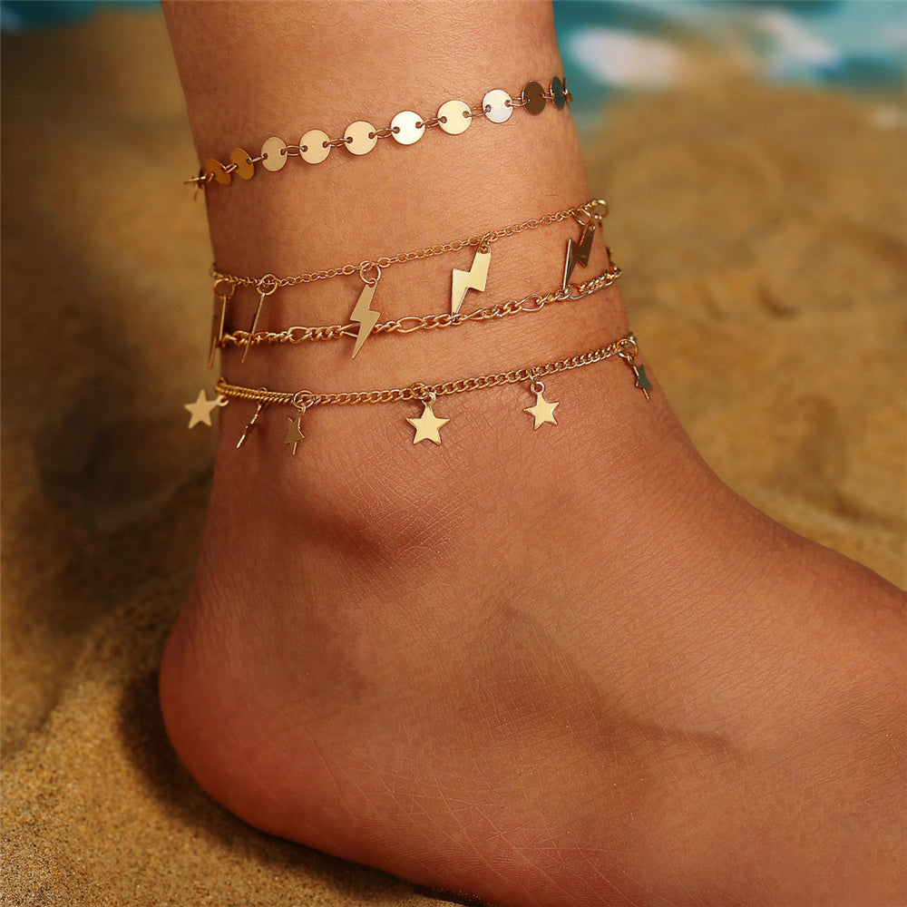 stellar spark – 4-teiliges fußkettchen-set mit sternen & blitzen - lunastein - schmuck