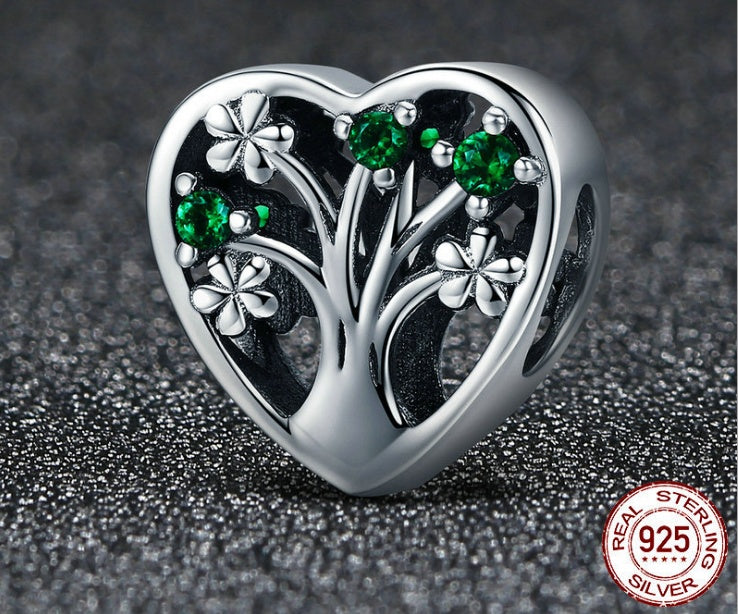 love of life charm – herzförmiger lebensbaum-charm aus 925 silber mit grünen zirkonia - lunastein