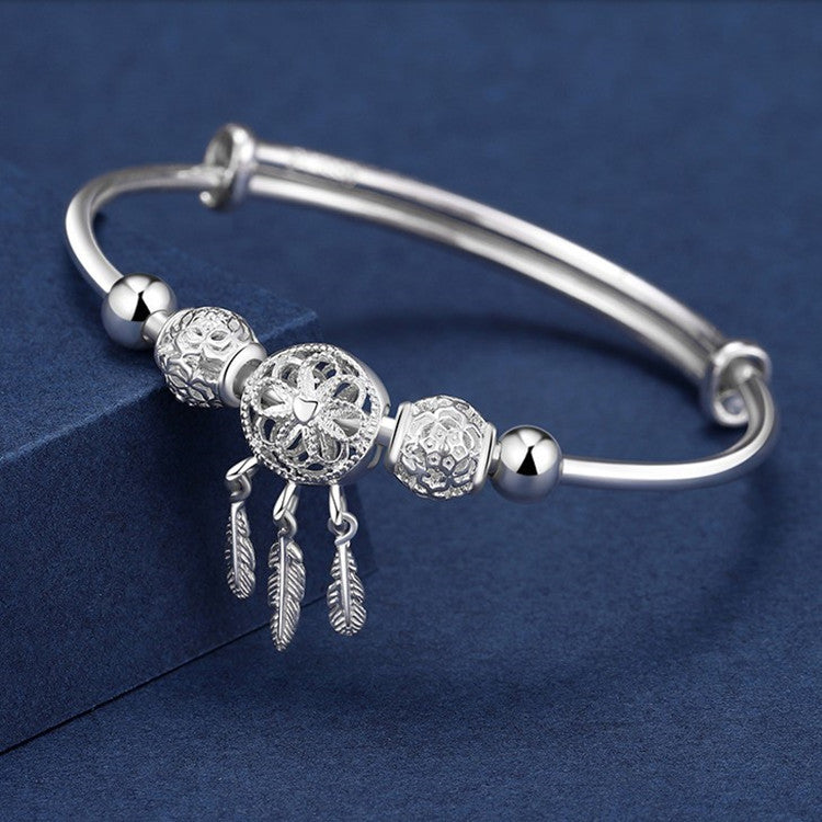 traumfängerlicht – charm-armband in silberoptik mit federanhängern - lunastein
