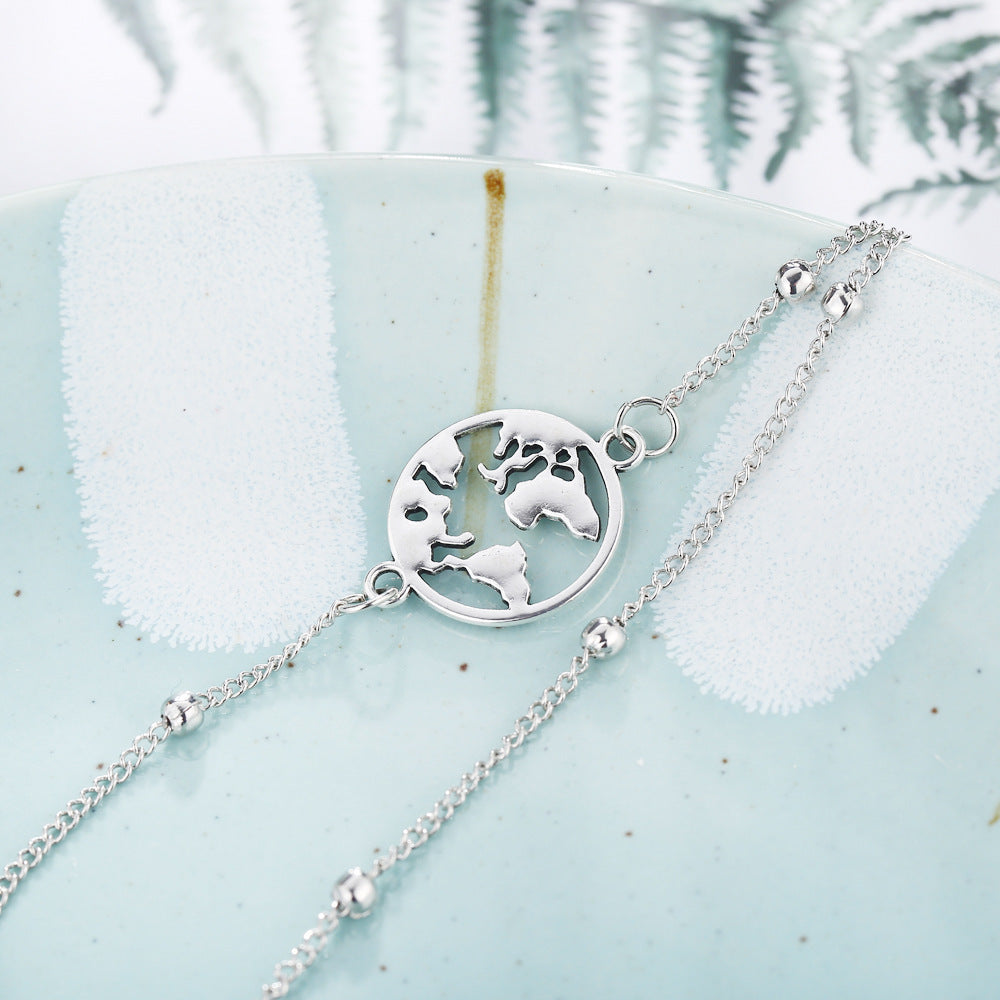 wanderlove – 3-teiliges fußkettchen-set in silber mit symbolen - lunastein - schmuck