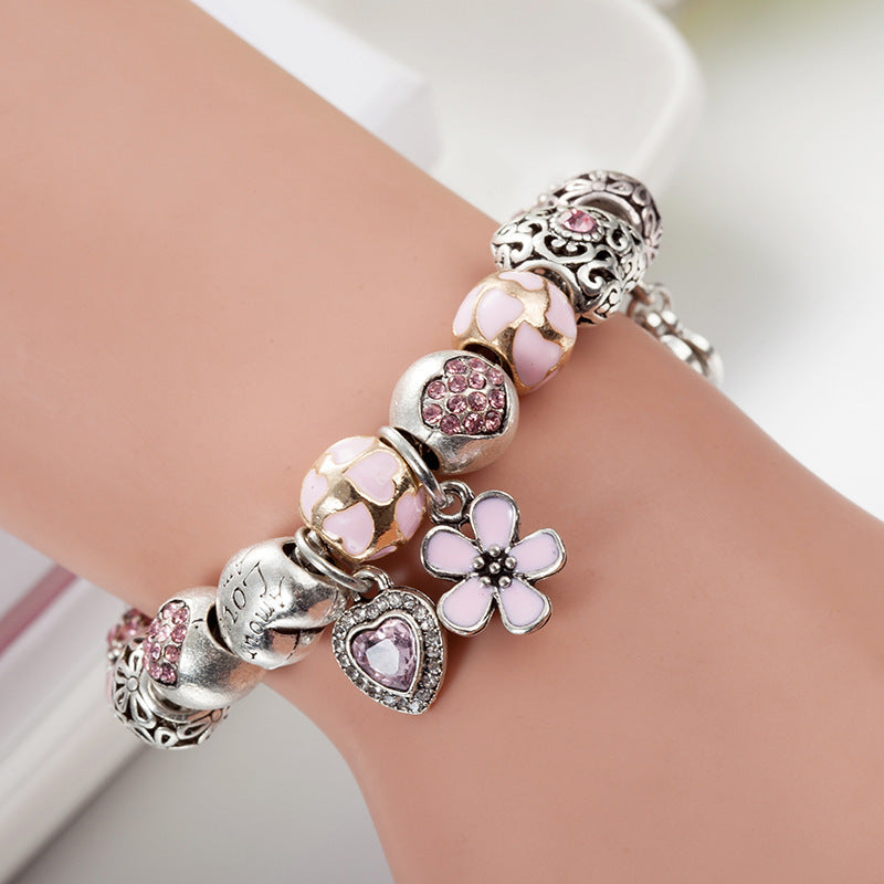 blütenherz - elegantes damen-charm-armband mit stern & kristallen – silberfarben - lunastein