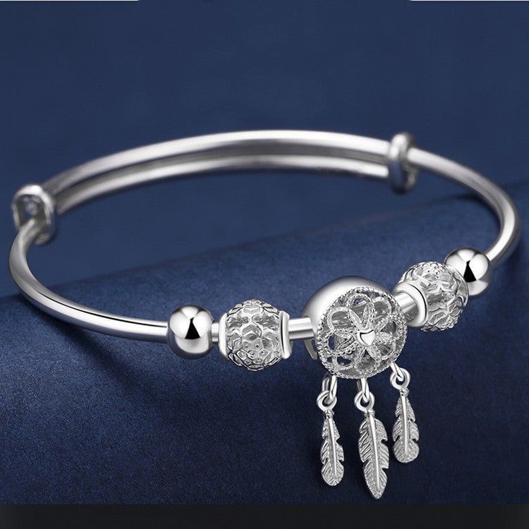 traumfängerlicht – charm-armband in silberoptik mit federanhängern - lunastein