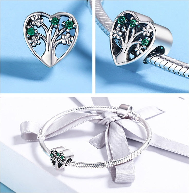love of life charm – herzförmiger lebensbaum-charm aus 925 silber mit grünen zirkonia - lunastein