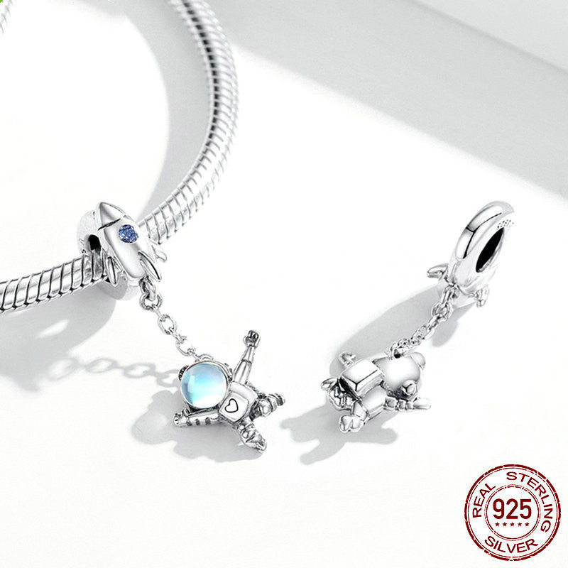 astronaut charm 2025 – anhänger mit rakete & mondstein in 925 silber - lunastein