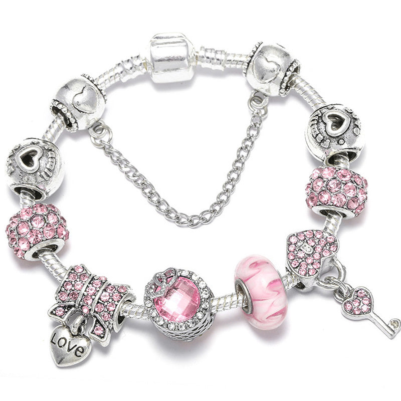 royal bloom – charm-armband mit krönchen & glanzdetails - lunastein