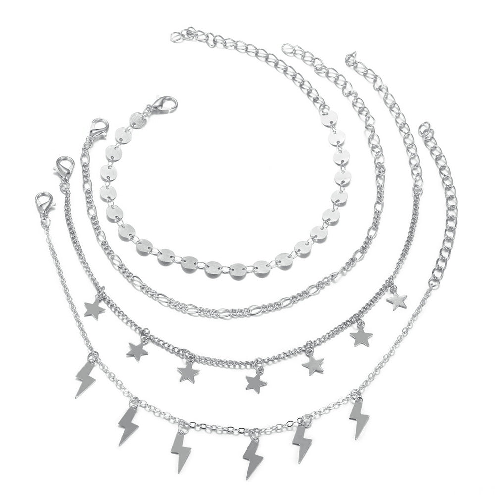 stellar spark – 4-teiliges fußkettchen-set mit sternen & blitzen - lunastein - schmuck