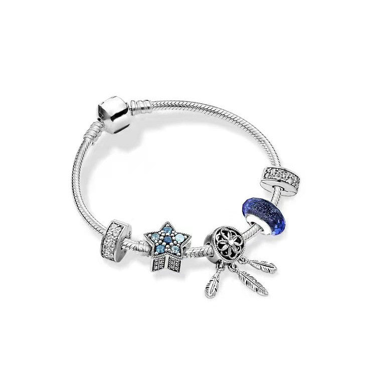 sternenflug – charm-armband in silber- oder roségoldoptik mit stern- und traumfänger-design - lunastein