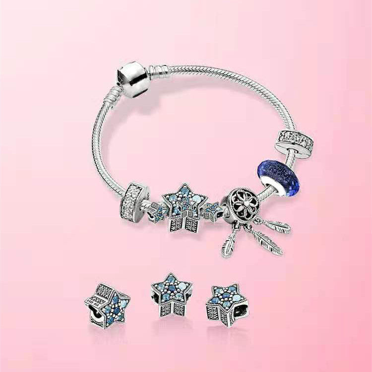 sternenflug – charm-armband in silber- oder roségoldoptik mit stern- und traumfänger-design - lunastein