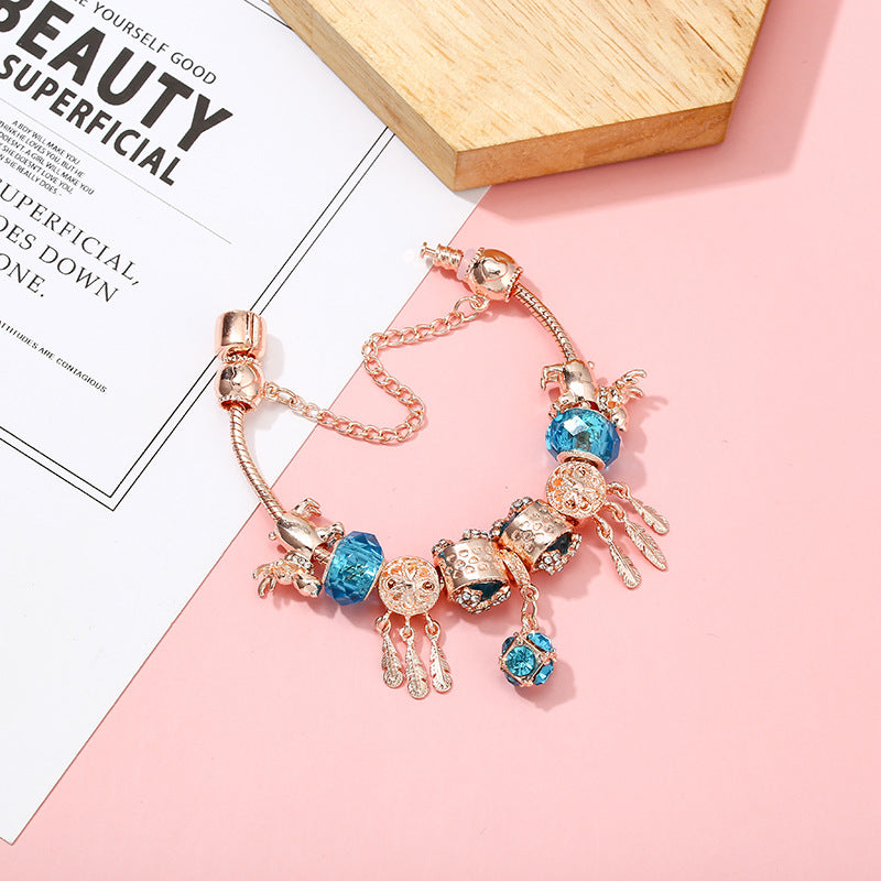 dreamcatcher tassel bracelet – roségoldenes damenarmband mit charms & krone - lunastein