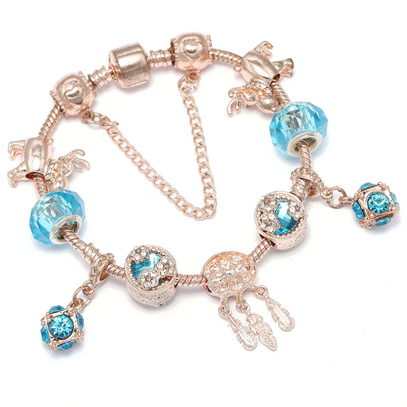 dreamcatcher tassel bracelet – roségoldenes damenarmband mit charms & krone - lunastein