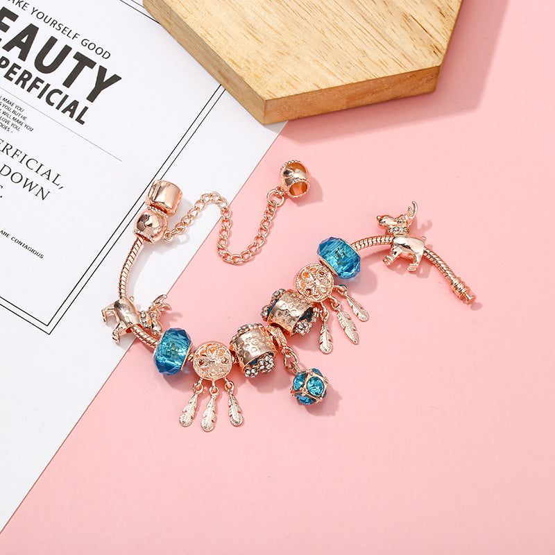dreamcatcher tassel bracelet – roségoldenes damenarmband mit charms & krone - lunastein