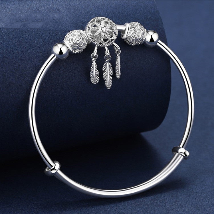 traumfängerlicht – charm-armband in silberoptik mit federanhängern - lunastein