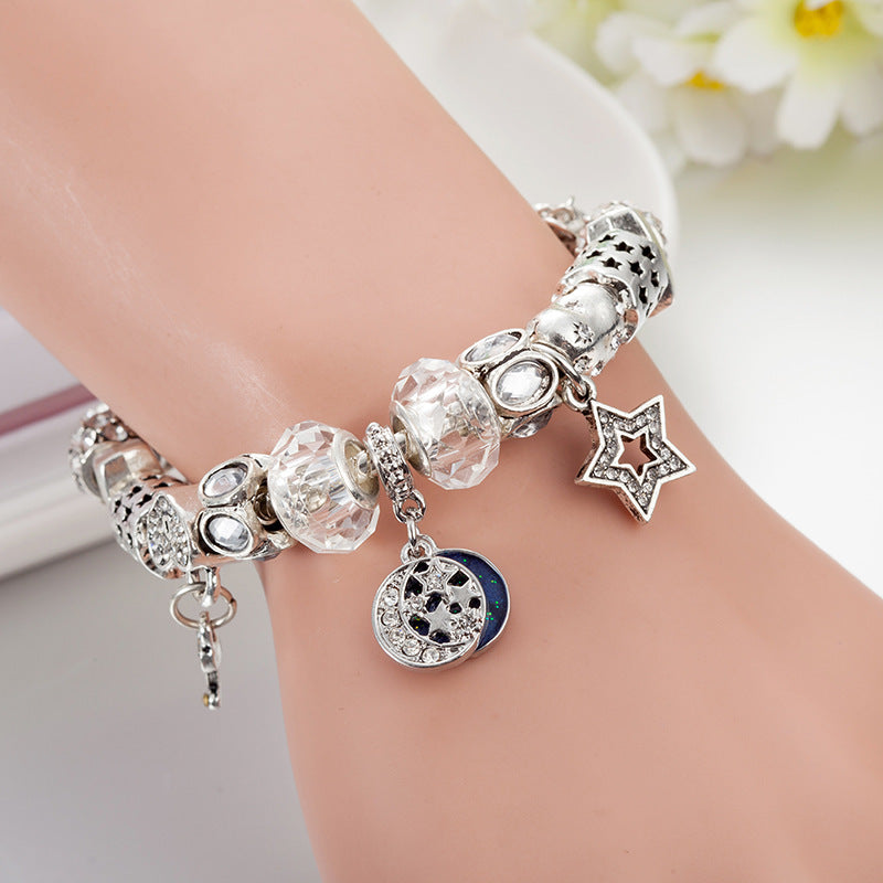 Blütenherz - Elegantes Damen-Charm-Armband mit Stern & Kristallen – Silberfarben - Lunastein