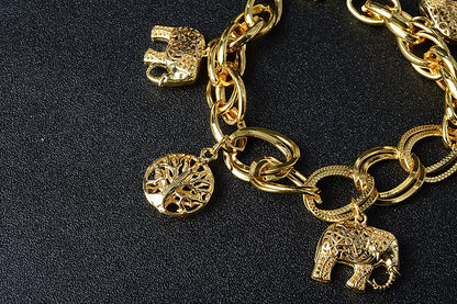 Spirit of Nature – Goldfarbenes Charm-Armband mit Elefanten & Lebensbaum - Lunastein