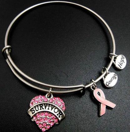 Herzensmut – Charm-Armband mit pinker Schleife & Survivor-Herz - Lunastein