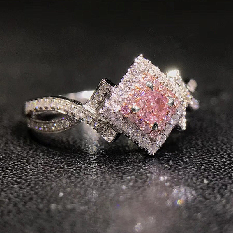 pink aurora – zirkonia-ring mit funkelndem zentrum - lunastein