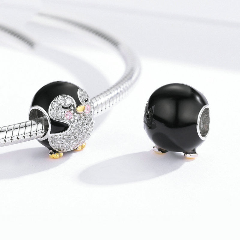 Happy Little Penguin Charm – Glitzernder Pinguin-Anhänger aus 925er Silber - Lunastein