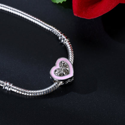 Heart Bow Charm – Herz-Charm mit rosa Emaille & Schleifenmotiv - Lunastein