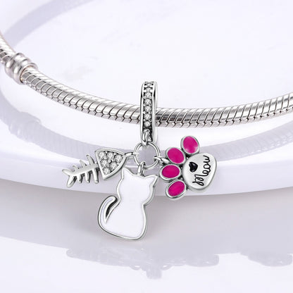 Meow Cat Charm – Katzenanhänger mit Pfote, Fischgräte & Emaille - Lunastein