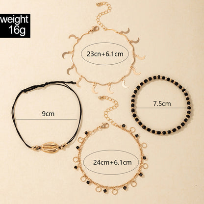 Luna Coast – 4-teiliges Fußkettchen-Set in Gold & Schwarz - Lunastein - Schmuck